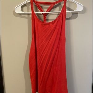 Free People Movement, orange open back top